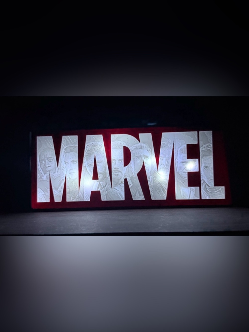 Marvel Illuminated White Logo on Red Backdrop